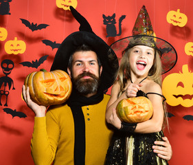 Fototapeta premium Girl and bearded man with happy faces on red background