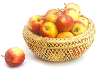 Fresh Little Apples in basket on wihte background