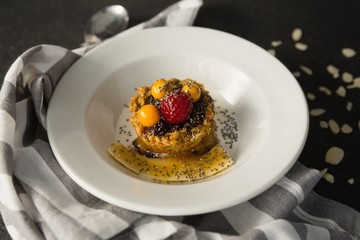 Plate of breakfast cereals with fruits
