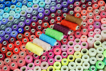 Spools of colored sewing thread