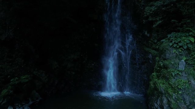 Dark waterfall shot in the drone
