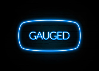 Gauged  - colorful Neon Sign on brickwall