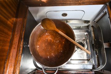 Spaghetti sauce cooked on a yacht