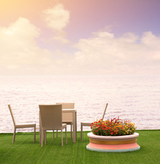 Rattan armchairs with sea view