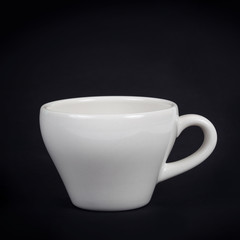white coffee cup on black background
