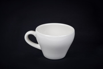 white coffee cup on black background