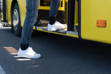 man entering city bus