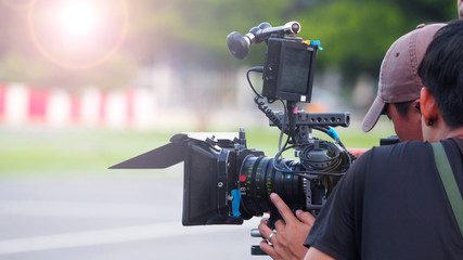 Blurry image of movie shooting and light flare.