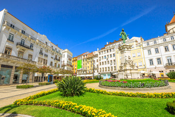 Largo de Portagem square in a beautiful sunny day with blue sky. Historic center of Coimbra in Central Portugal, Europe.