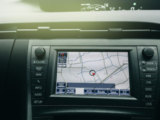 console and monitor disply technnology in car with GPS navigator for  combine with interior design in luxury car