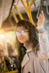 Obraz na płótnie Canvas pensive girl in bus