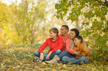 Fototapeta premium family in autumn forest