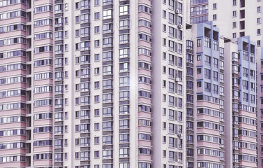 Obraz premium Vintage stylized picture of apartment buildings, urban background.
