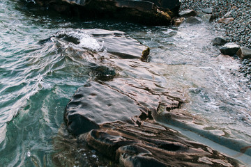 Summer landscape with rocks and sea