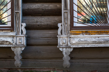 Fragments of the carved wooden trim on old houses in Tomsk, Western Siberia, Russia.