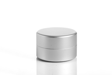 empty aluminum jars cosmetic, lotion packaging on a white background