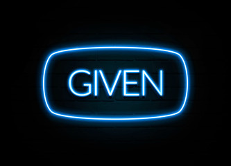 Given  - colorful Neon Sign on brickwall