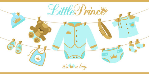 Royal baby boy shower card. Baby clothes hanging on a rope 