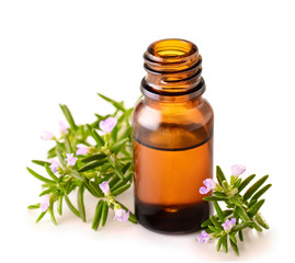 rosemary essential oil isolated on white