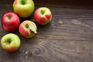 apples on wooden table