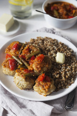 Meatballs with vegetable sauce and buckwheat