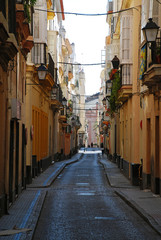 Fototapeta na wymiar Typical small street in Cadiz, Spain