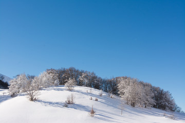 Fototapeta na wymiar Winter landscape with snow. Campo Felice, Italy