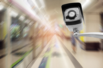 cctv with blur of subway station