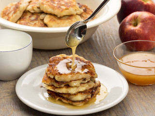 Apple pancakes with honey and milk