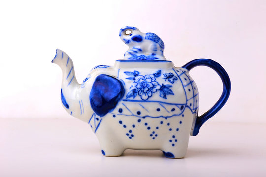 asian  elephant teapot on white background