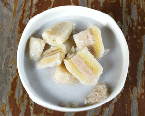 Banana in Coconut Milk. Thai dessert. Banana sliced boil in coconut milk with sugar. Sweet taste and Hi nutritiion. Top view.