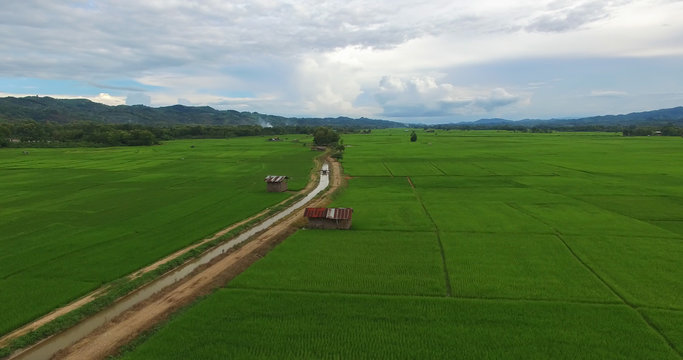 Image of beautiful Terraced rice field in water season and Irrigation from drone,Top view of rices paddy field,nan,thailand