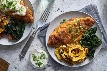 Foto auf Acrylglas Antireflex panfried catfish dinner with squash and spinach in flat lay compositon © Joshua Resnick