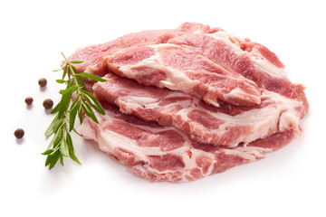 Raw sliced pork meat, isolated on white background