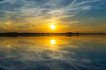 Fototapeta na wymiar Beautiful Sunset at a lake