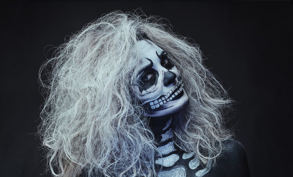 Halloween female skull makeup.