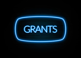 Grants  - colorful Neon Sign on brickwall