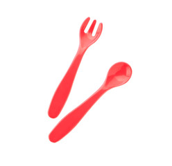 Colorful eating utensils for baby on white background