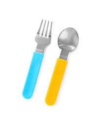 Colorful eating utensils for baby on white background