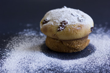 Tasty vanilla muffins on an ornamented plate