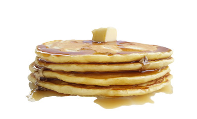 Homemade pancakes with butter and maple syrup