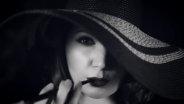 4k Woman Smoking with Cigarette Holder, black and white