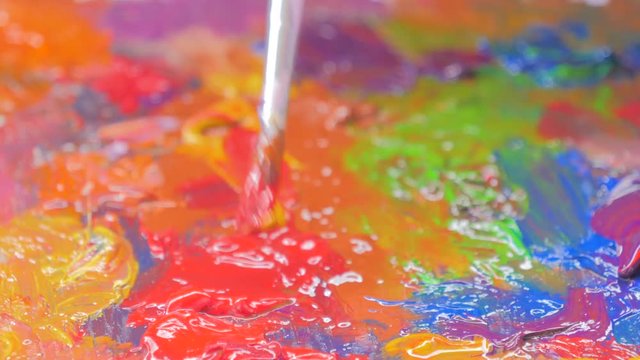 Oil colors mixing process by Artist brush.