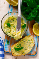 Butter with a basil and a lemon for sandwiches