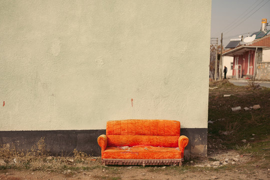 The Empty Orange Couch