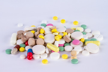 pile of tablets and pills and capsule