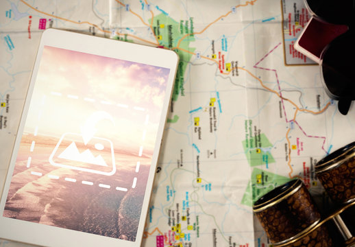 Tablet with Map and Accessories Mockup