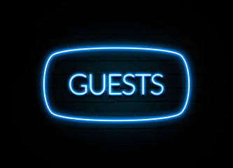 Guests  - colorful Neon Sign on brickwall
