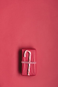 Christmas gift with candy cane wrapping