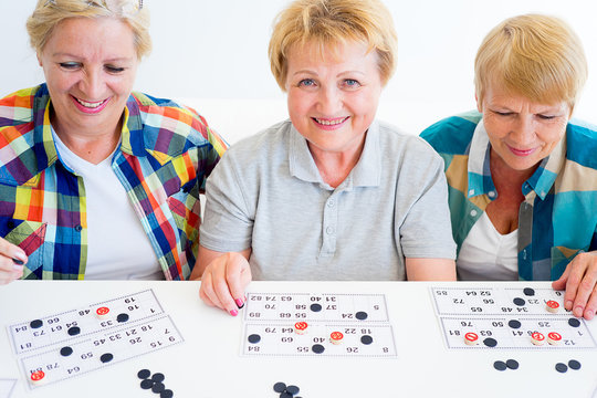 Senior People Playing Board Games